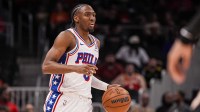 Philadelphia 76ers guard Tyrese Maxey (0) brings the ball up the court against the Atlanta Hawks during the first half at State Farm Arena.