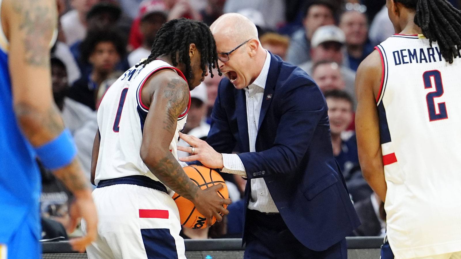 UConn Huskies head coach Dan Hurley reacts with guard Malachi Smith (0)