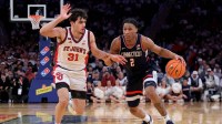 Connecticut Huskies guard Silas Demary Jr. (2) controls the ball against St. John's Red Storm guard Lefteris Liotopoulos (31) during the first half of the men's Big East Conference Tournament Championship game at Madison Square Garden.