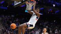 UConn Huskies forward Tarris Reed Jr. (5) dunks the ball in the second half during a first round game of the men's 2026 NCAA Tournament at Xfinity Mobile Arena.