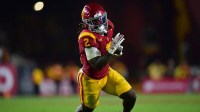 Southern California Trojans running back Waymond Jordan (2) runs the ball against the Michigan State Spartans during the second half at the Los Angeles Memorial Coliseum.