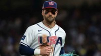 United States first baseman Bryce Harper (24) returns to the dugout out in the third inning during the 2026 World Baseball Classic Championship game at loanDepot Park.