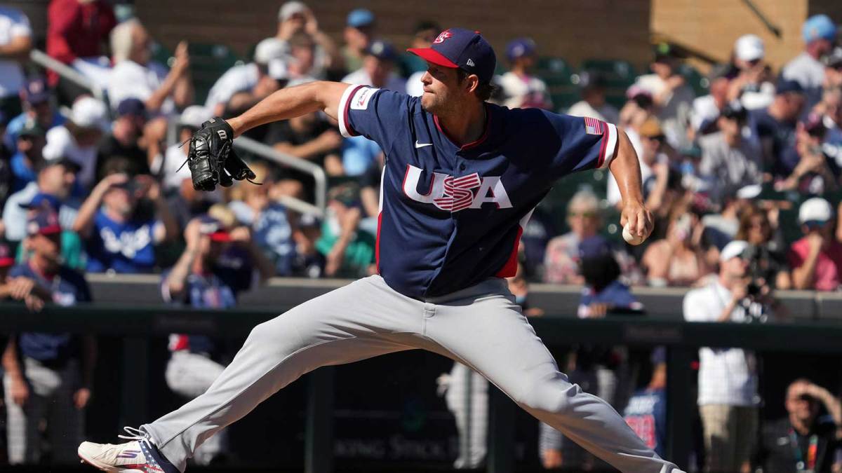United States pitcher Clayton Kershaw (22) throws