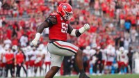Georgia Bulldogs defensive lineman Christen Miller (52) reacts after a defensive stop against the Austin Peay Governors in the fourth quarter at Sanford Stadium.