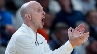 VCU Rams head coach Phil Martelli Jr. instructs his team against the North Carolina Tar Heels in the second half of a first round game of the men's 2026 NCAA Tournament at Bon Secours Wellness Arena.