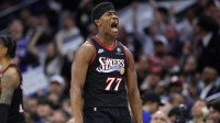 Philadelphia 76ers guard Vj Edgecombe (77) reacts after his three pointer against the Oklahoma City Thunder during the fourth quarter at Xfinity Mobile Arena.