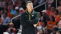 Vanderbilt head coach Mark Byington stands on the sidelines during a men’s college basketball game between the Tennessee Vols and Vanderbilt Commodores.