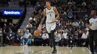 San Antonio Spurs forward Victor Wembanyama (1) dribbles up the court in the first half against the Phoenix Suns at Frost Bank Center.
