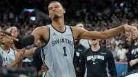 San Antonio Spurs forward Victor Wembanyama (1) celebrates after the game against the Phoenix Suns at Frost Bank Center.