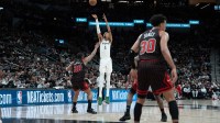 San Antonio Spurs forward Victor Wembanyama (1) shoots over Chicago Bulls forward Guerschon Yabusele (28) in the second half at Frost Bank Center.