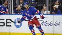 New York Rangers center Vincent Trocheck (16) reacts after scoring a goal during a shootout against the Pittsburgh Penguins at Madison Square Garden.