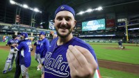Vinnie Pasquantino (9) celebrates after defeating Mexico at Daikin Park.