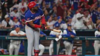 Mar 11, 2026; Miami, FL, United States; Dominican Republic first baseman Vladimir Guerrero Jr. (27) looks on after hitting a home run against Venezuela during the third inning at loanDepot Park. Mandatory Credit: Sam Navarro-Imagn Images