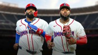 Dominican Republic's Junior Caminero and Vladimir Guerrero Jr. stand