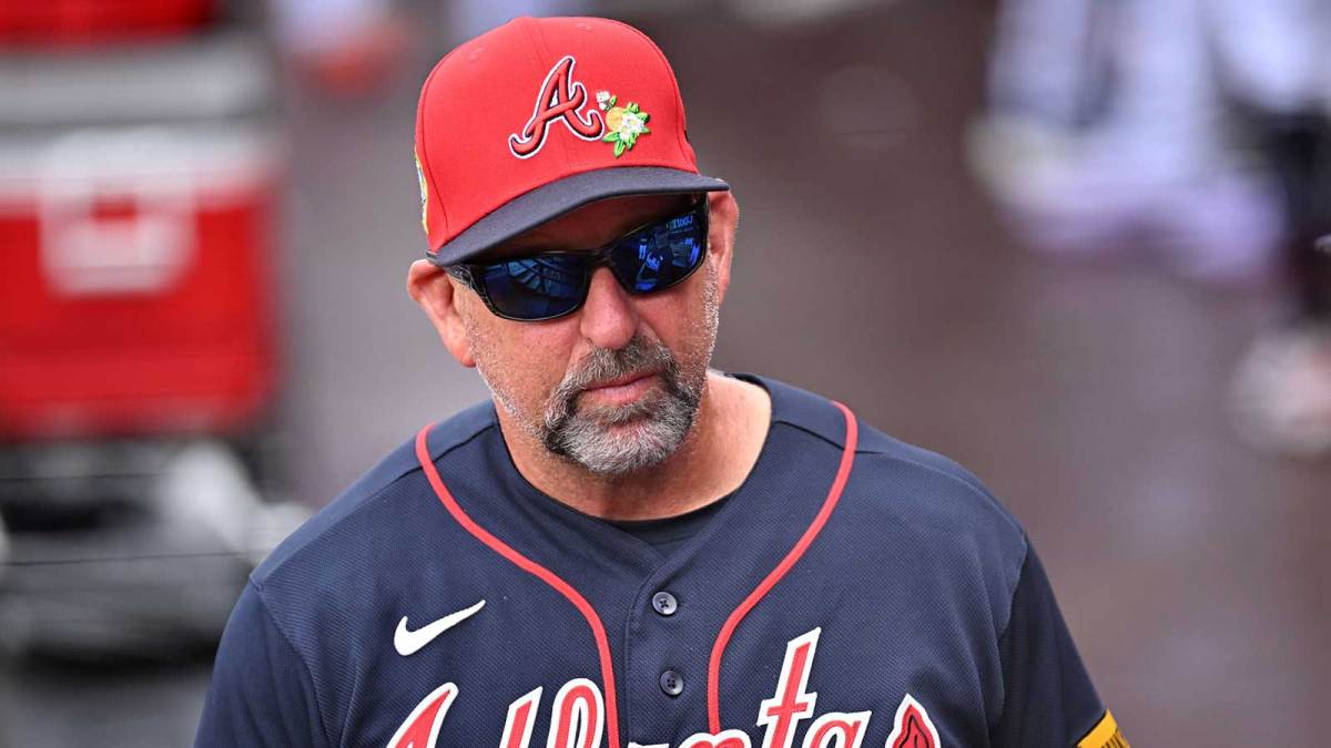 Atlanta Braves manager Walt Weiss (4) prepares for the start of the game against the Boston Red Sox during spring training at CoolToday Park.
