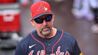 Atlanta Braves manager Walt Weiss (4) prepares for the start of the game against the Boston Red Sox during spring training at CoolToday Park.