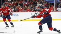 Washington Capitals defenseman John Carlson (74) scores a goal /Wednesday/ during the first period at Capital One Arena.