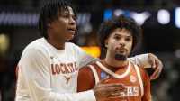 Texas Longhorns guard Jordan Pope (0) walks off the court after losing to the Purdue Boilermakers during a Sweet Sixteen game of the West Regional of the men's 2026 NCAA Tournament at SAP Center.