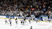 the Western Michigan Broncos celebrate after defeating the Boston University Terriers in the Frozen Four college ice hockey national championship at Enterprise Center.