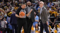 Connecticut Huskies head coach Dan Hurley argues with an official before being ejected during the second half against the Marquette Golden Eagles at Fiserv Forum.
