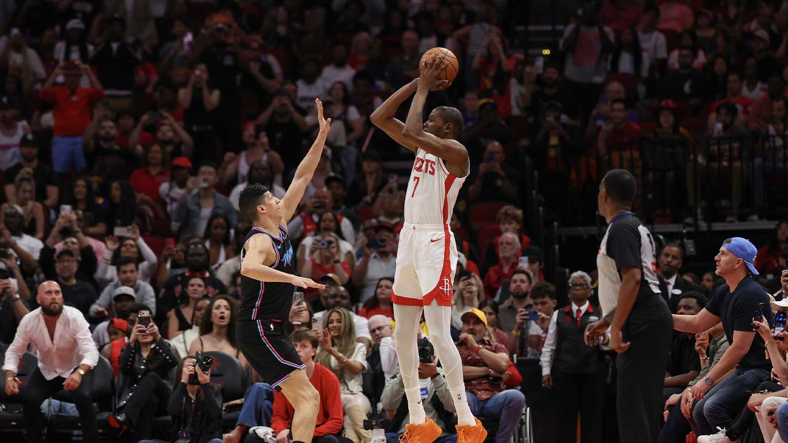 Houston Rockets forward Kevin Durant (7) makes a three point basket against Miami Heat forward Simone Fontecchio (0) in the second half at Toyota Center. Durant scored 27 points in the game passing Michael Jordan for fifth all time in points in the NBA.