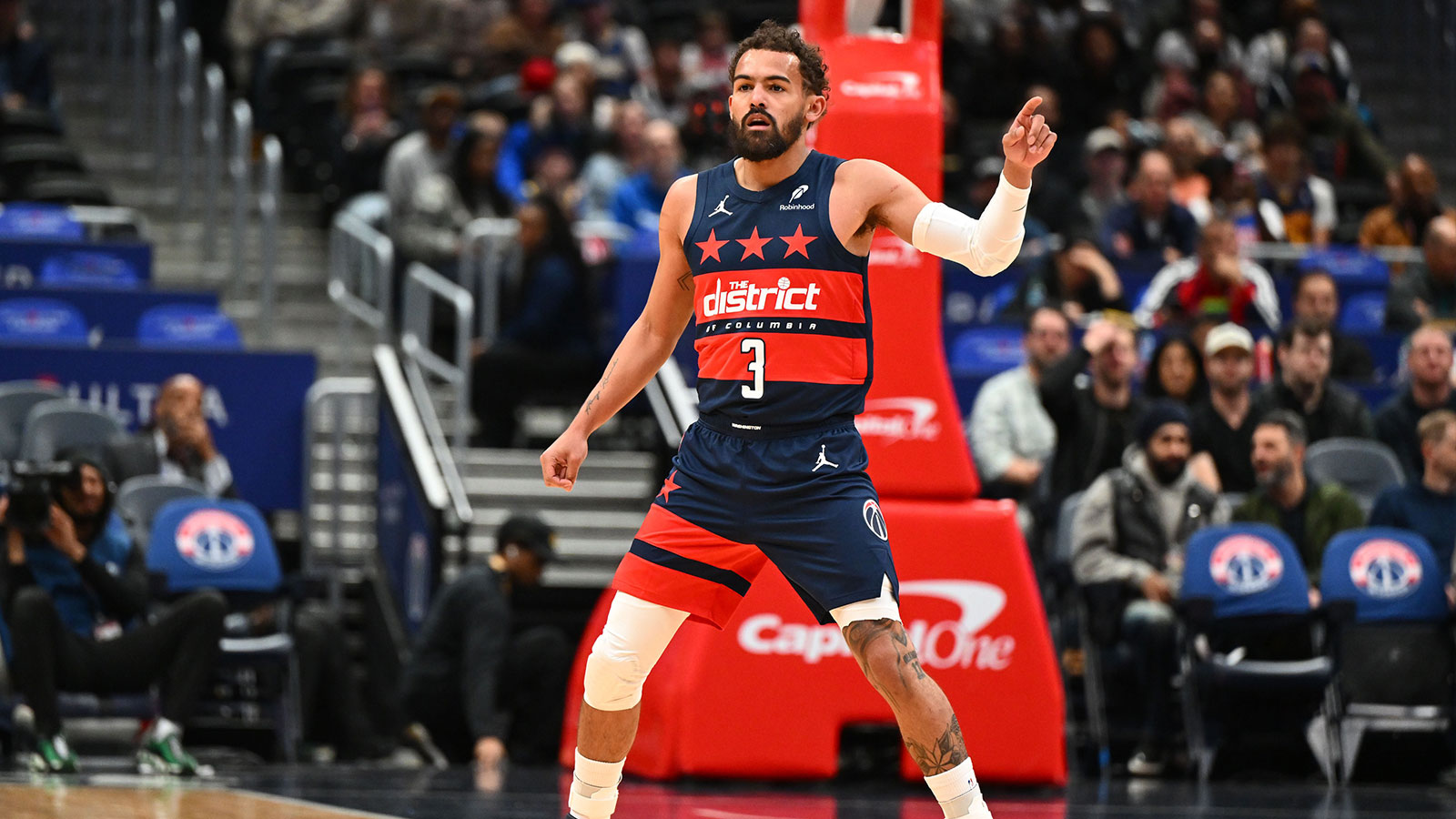 Washington Wizards guard Trae Young (3) on the court against the Golden State Warriors during the first half at Capital One Arena.