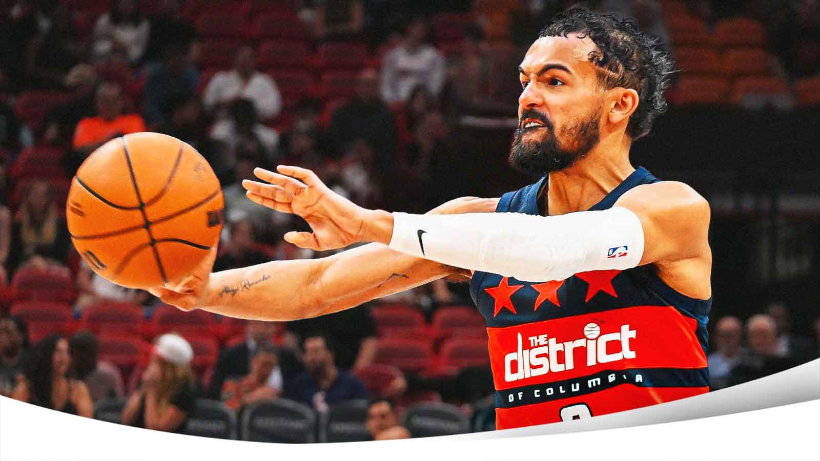 Trae Young passes basketball