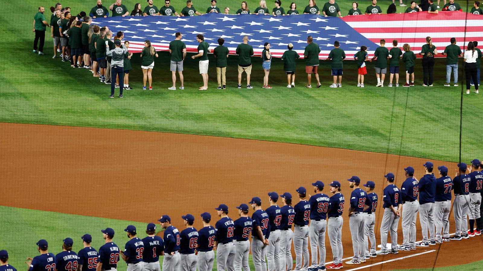 Team USA stands for introductions at LoanDepot Park. 
