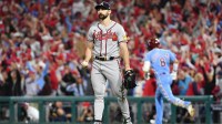 Atlanta Braves starting pitcher Spencer Strider (99) reacts after giving up a solo home run to Philadelphia Phillies right fielder Nick Castellanos (8) during the sixth inning during game four of the NLDS for the 2023 MLB playoffs at Citizens Bank Park.