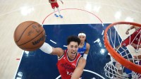 LA Clippers center Yanic Konan Niederhauser (14) shoots the ball against Orlando Magic forward Paolo Banchero (5) in the second half at Intuit Dome.