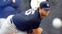 New York Yankees pitcher Gerrit Cole (45) throws a bullpen session during spring training practices at George M. Steinbrenner Field.