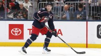 Columbus Blue Jackets defenseman Zach Werenski (8) controls the puck against the Chicago Blackhawks during the first period at Nationwide Arena.