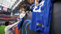 Indianapolis Colts linebacker Zaire Franklin (44) signs autographs prior to a game against the Houston Texans at NRG Stadium. Mandatory Credit: Thomas Shea-Imagn Images