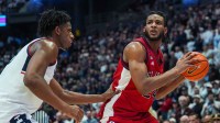 St. John's Red Storm forward Zuby Ejiofor (24) looks for an opening against UConn Huskies forward Tarris Reed Jr. (5) in the second half at PeoplesBank Arena.