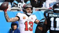 Tampa Bay Buccaneers wide receiver Mike Evans (13) reacts after a touchdown during the first half against the Carolina Panthers at Bank of America Stadium.