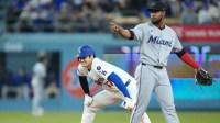 Los Angeles Dodgers designated hitter Shohei Ohtani (17) reacts after stealing second during the second inning against the Miami Marlins at Dodger Stadium.