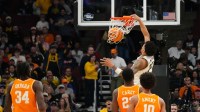 Michigan Wolverines forward Yaxel Lendeborg (23) dunks in the second half against the Tennessee Volunteers during an Elite Eight game of the Midwest Regional of the men's 2026 NCAA Tournament at United Center.
