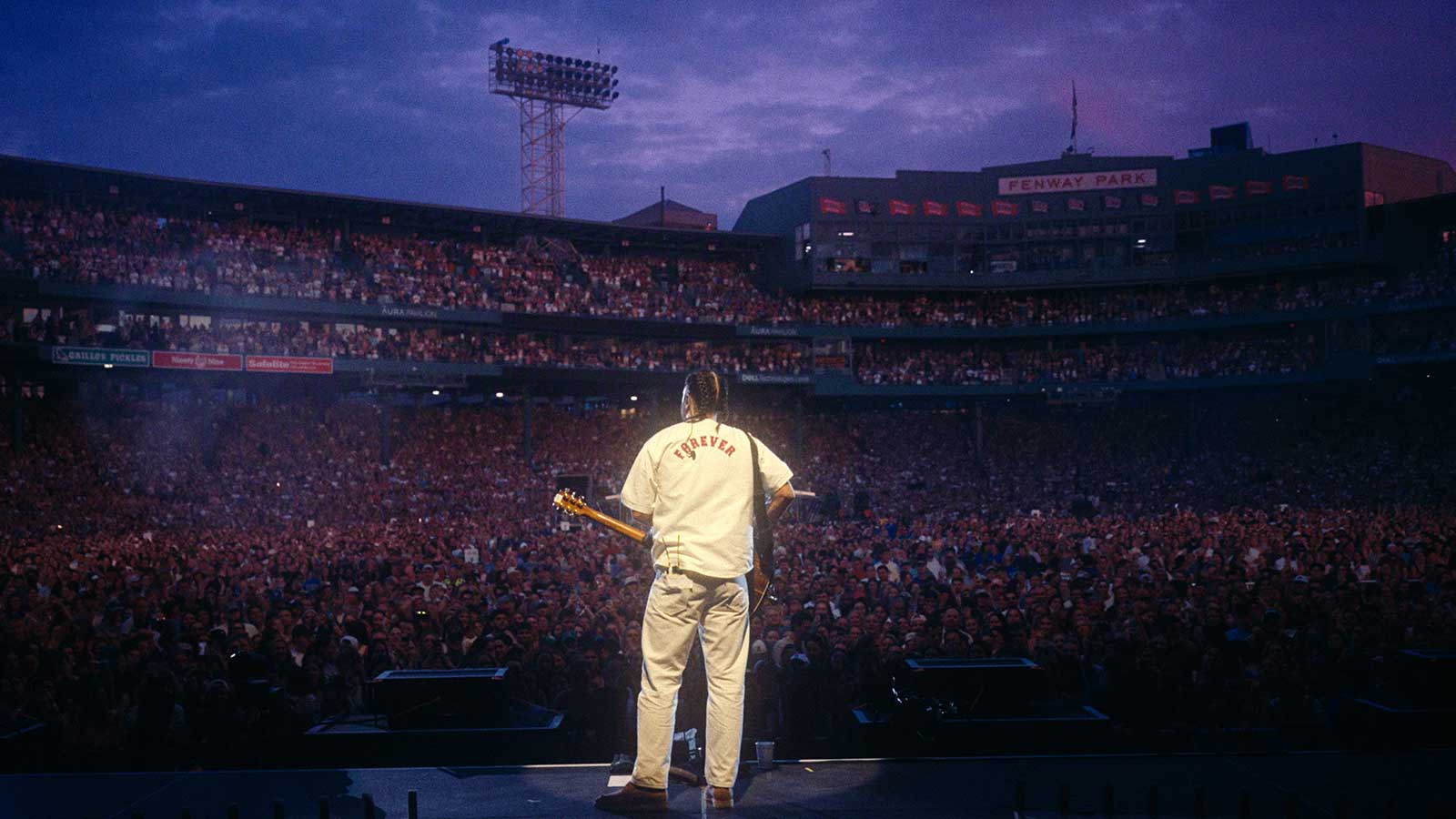 Noah Kahan performing at Fenway Park as captured in Out of Body.