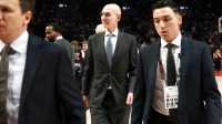 NBA Commissioner Adam Silver walks towards the exit at the end of the first half of the Portland Trail Blazers and Utah Jazz game at Moda Center