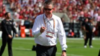 Alabama Crimson Tide Athletic Director Greg Byrne greets players before a game against the Vanderbilt Commodores at Saban Field at Bryant-Denny Stadium.