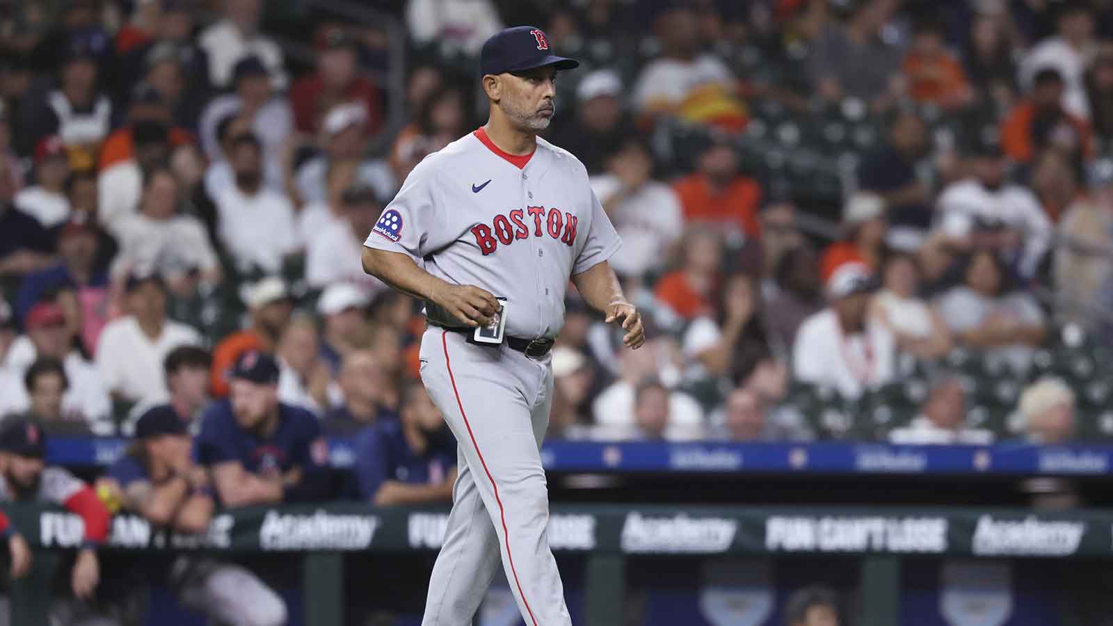 Boston Red Sox manager Alex Cora walks to the mound for a pitching change during the fifth inning against the Houston Astros at Daikin Park.