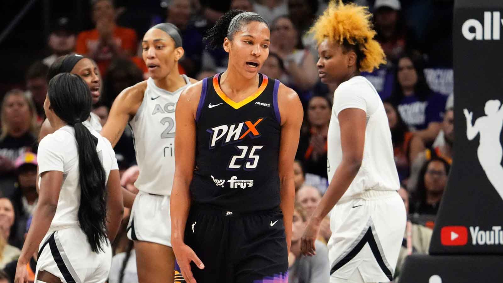 Phoenix Mercury forward Alyssa Thomas (25) reacts after a foul by the Las Vegas Aces in Game Four of the WNBA Finals at Mortgage Matchup Center on Oct. 10, 2025, in Phoenix.