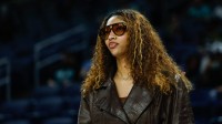 Injured Chicago Sky forward Angel Reese (5) stands on the sidelines before a WNBA game against the New York Liberty at Wintrust Arena.