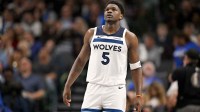 Minnesota Timberwolves guard Anthony Edwards (5) comes back on the court during the second quarter against the Dallas Mavericks at the American Airlines Center.