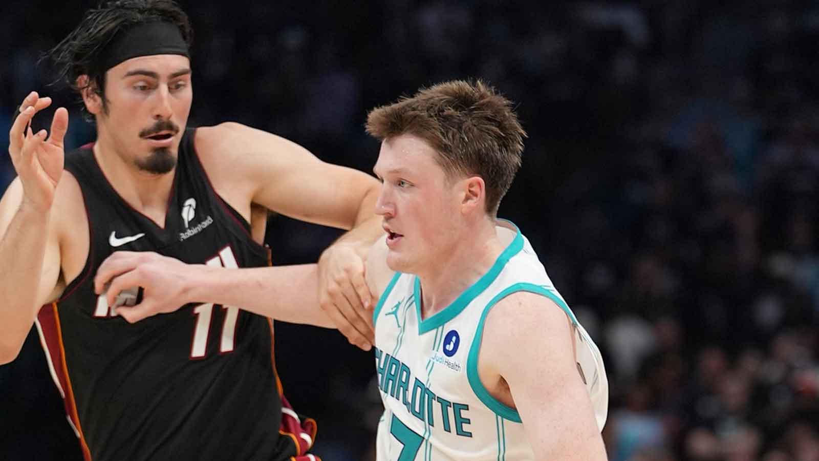 https://wp.clutchpoints.com/wp-content/uploads/2026/04/Apr-14-2026-Charlotte-North-Carolina-USA-Charlotte-Hornets-guard-Kon-Knueppel-7-dribbles-the-ball-defended-by-Miami-Heat-guard-Jaime-Jaquez-Jr.-11-during-the-second-half-during-the-play-in-rounds-be.jpg