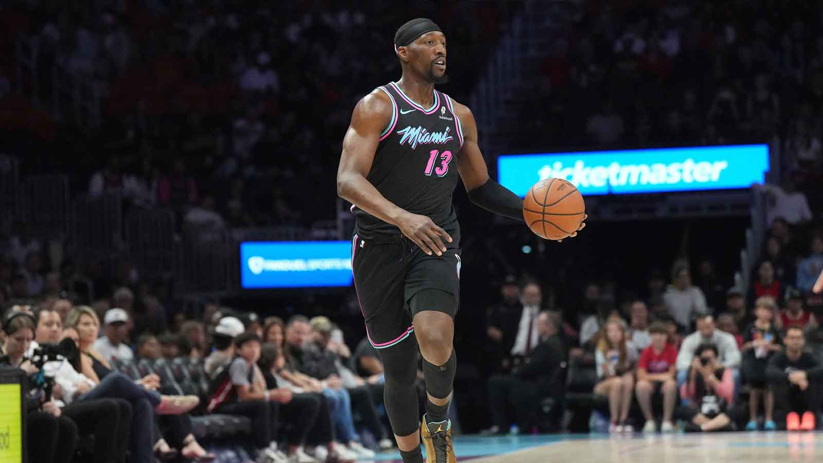 Miami Heat center Bam Adebayo (13) brings the ball up the court against the Washington Wizards during the first half at Kaseya Center.