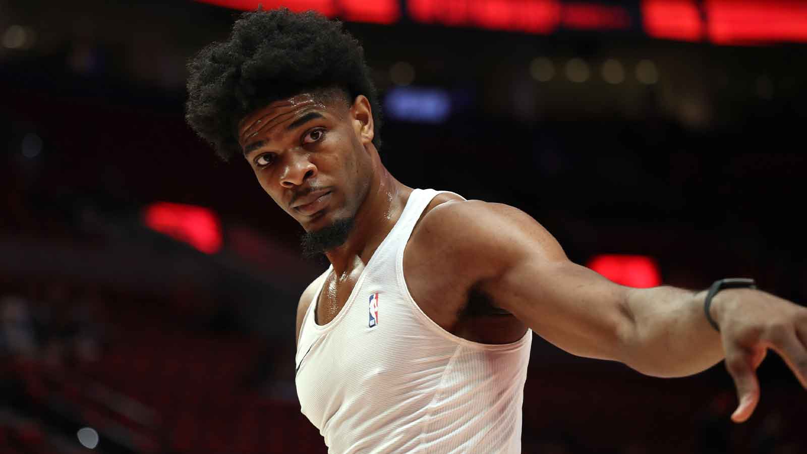Blazers guard Scoot Henderson (00) looks towards a staff member during warm ups before playing against the San Antonio Spurs in game three of the first round of the 2026 NBA Playoffs at Moda Center