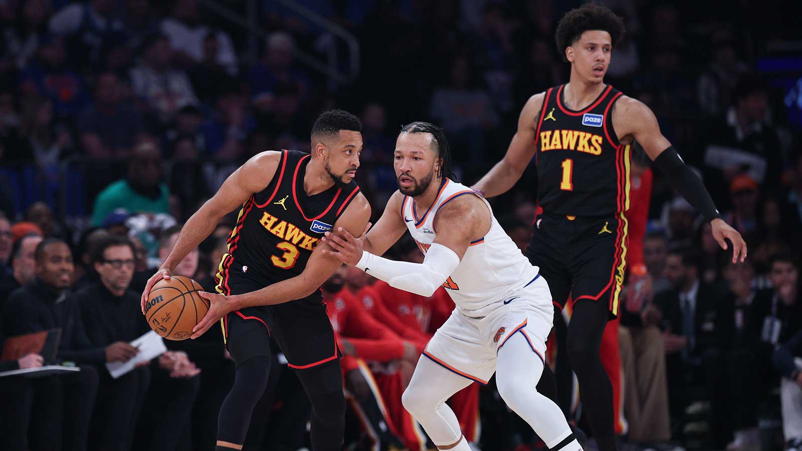 Atlanta Hawks guard CJ McCollum (3) is guarded by New York Knicks guard Jalen Brunson (11) during the first quarter of the 2026 NBA Playoffs at Madison Square Garden.