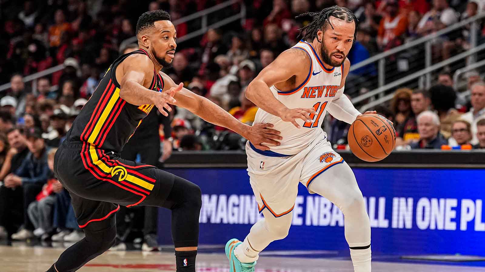 https://wp.clutchpoints.com/wp-content/uploads/2026/04/CJ-McCollum-guarding-Jalen-Brunson-during-game-between-Hawks-and-Knicks.jpg