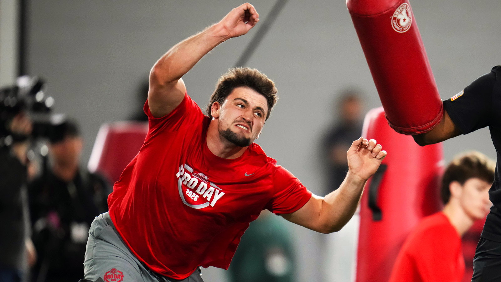 Ohio State Buckeyes defensive end Caden Curry (92) runs during Pro Day for NFL scouts at the Woody Hayes Athletics Center on March 25, 2026.